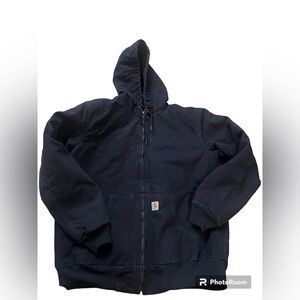 Woman’s navy Carhart jacket size large